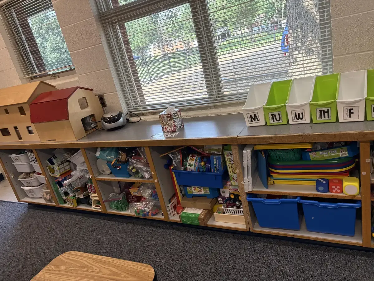 Classroom daily bins and sorted learning materials on open shelving, Winchester VA